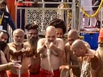 Union Home Minister Amit Shah takes a holy dip during Mahakumbh, at Sangam in Prayagraj on Monday.