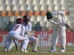 Pakistan's Kashif Ali (R) is clean bowled during the third day of the second Test cricket match between Pakistan and West Indies at the Multan Cricket Stadium in Multan on January 27 Pakistan's Kashif Ali (R) is clean bowled during the third day of the second Test cricket match between Pakistan and West Indies at the Multan Cricket Stadium in Multan on January 27