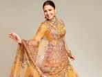 If you are a bride looking for pre-wedding lehenga options, take inspiration from Anushka Sharma and opt for a yellow shade that complements your skin tone. (Instagram/ mahimamahajanofficial) If you are a bride looking for pre-wedding lehenga options, take inspiration from Anushka Sharma and opt for a yellow shade that complements your skin tone. (Instagram/ mahimamahajanofficial)
