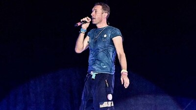Coldplay, the British rock band, consists of vocalist and pianist Chris Martin, guitarist Jonny Buckland, bassist Guy Berryman, drummer and percussionist Will Champion, and manager Phil Harvey. 