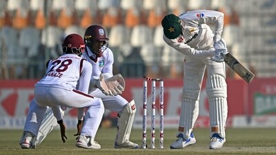 Pakistan's Kashif Ali (R) is clean bowled during the third day of the second Test cricket match between Pakistan and West Indies at the Multan Cricket Stadium in Multan on January 27 (AFP)