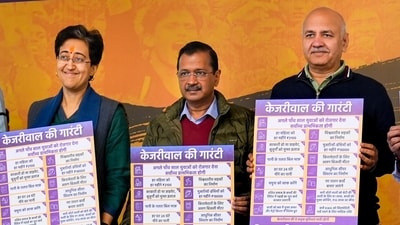 New Delhi: AAP National Convenor Arvind Kejriwal, with Delhi CM Atishi and former MLA Manish Sisodia, releases the party's manifesto featuring 15 guarantees ahead of the Delhi Assembly poll in New Delhi, Monday, Jan. 27, 2025. (PTI) New Delhi: AAP National Convenor Arvind Kejriwal, with Delhi CM Atishi and former MLA Manish Sisodia, releases the party's manifesto featuring 15 guarantees ahead of the Delhi Assembly poll in New Delhi, Monday, Jan. 27, 2025. (PTI)