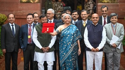 Budget 2025 date and time: File photo of Nirmala Sitharaman, carrying the Finance Budget ahead of the presentation of interim Budget 2024 in Parliament on Thursday, February 1, 2024. (Sanchit Khanna/HT) Budget 2025 date and time: File photo of Nirmala Sitharaman, carrying the Finance Budget ahead of the presentation of interim Budget 2024 in Parliament on Thursday, February 1, 2024. (Sanchit Khanna/HT)