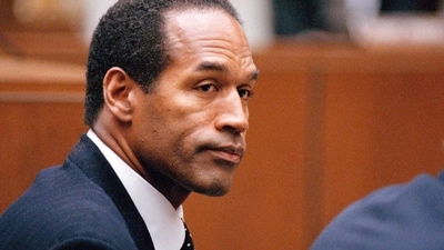 FILE - O.J. Simpson sits at his arraignment in Superior Court in Los Angeles on July 22, 1994, where he pleaded "absolutely, 100 percent not guilty" on murder charges. Simpson, the decorated football superstar and Hollywood actor who was acquitted of charges he killed his former wife and her friend but later found liable in a separate civil trial, died Wednesday, April 11, 2024, of prostate cancer. He was 76. (AP Photo/Pool/Lois Bernstein, Pool) (AP) FILE - O.J. Simpson sits at his arraignment in Superior Court in Los Angeles on July 22, 1994, where he pleaded "absolutely, 100 percent not guilty" on murder charges. Simpson, the decorated football superstar and Hollywood actor who was acquitted of charges he killed his former wife and her friend but later found liable in a separate civil trial, died Wednesday, April 11, 2024, of prostate cancer. He was 76. (AP Photo/Pool/Lois Bernstein, Pool) (AP)