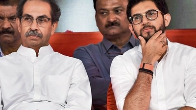 Shiv Sena (UBT) chief Uddhav Thackeray and son Aaditya. (PTI) Shiv Sena (UBT) chief Uddhav Thackeray and son Aaditya. (PTI)