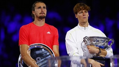 Italy's Jannik Sinner poses with the trophy alongside Germany's Alexander Zverev after the final (REUTERS)
