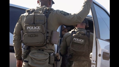 US Immigrations and Customs (ICE) Homeland Security Investigations (HSI) agents detain a person in Tucson, Arizona. (REUTERS) US Immigrations and Customs (ICE) Homeland Security Investigations (HSI) agents detain a person in Tucson, Arizona. (REUTERS)