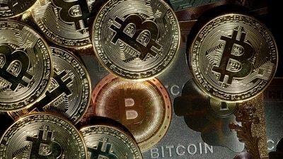 Only a few days after President Donald Trump's executive order identifying the digital-assets sector as a key engine of US innovation, Bitcoin fell as speculators booked profits. (REUTERS/Benoit Tessier)