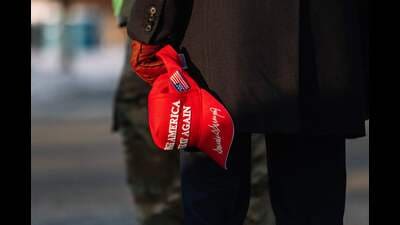 WASHINGTON, DC - JANUARY 20: A Pro-Trump supporter holding a MAGA hat stands outside of the United States Capitol before the inauguration of the 47th President of the United States of America, Donald J. Trump on January 20, 2025 in Washington, DC. Jim Vondruska/Getty Images/AFP (Photo by Jim Vondruska / GETTY IMAGES NORTH AMERICA / Getty Images via AFP) (Getty Images via AFP) WASHINGTON, DC - JANUARY 20: A Pro-Trump supporter holding a MAGA hat stands outside of the United States Capitol before the inauguration of the 47th President of the United States of America, Donald J. Trump on January 20, 2025 in Washington, DC. Jim Vondruska/Getty Images/AFP (Photo by Jim Vondruska / GETTY IMAGES NORTH AMERICA / Getty Images via AFP) (Getty Images via AFP)