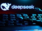 The deepseek logo, a keyboard, and robot hands are seen in this illustration taken January 27, 2025. 