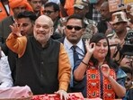 Union home minister and BJP leader Amit Shah with party MP Bansuri Swaraj during a roadshow in support of party candidate Neeraj Basoya ahead of Delhi assembly election in New Delhi on Tuesday Union home minister and BJP leader Amit Shah with party MP Bansuri Swaraj during a roadshow in support of party candidate Neeraj Basoya ahead of Delhi assembly election in New Delhi on Tuesday