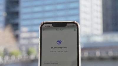 This photo illustration shows the DeepSeek app on a mobile phone in front of the building housing the headquarters of Chinese AI startup DeepSeek in Hangzhou, in China's eastern Zhejiang province. (AFP) This photo illustration shows the DeepSeek app on a mobile phone in front of the building housing the headquarters of Chinese AI startup DeepSeek in Hangzhou, in China's eastern Zhejiang province. (AFP)