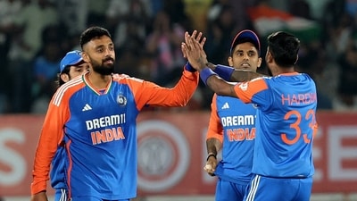 India's Varun Chakravarthy celebrates after taking the wicket of England's Brydon Carse (REUTERS)
