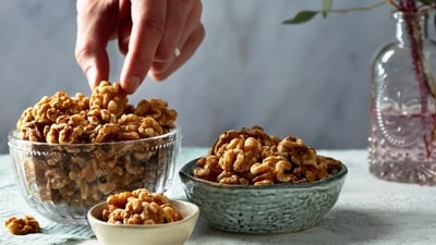 This bowl of walnuts is ready to be enjoyed as a healthy snack or incorporated into your favorite recipes.