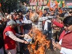 BJP party leaders and workers held a protest march and burned effigy of Arvind Kejriwal over his Yamuna 'poisoning' remark. BJP party leaders and workers held a protest march and burned effigy of Arvind Kejriwal over his Yamuna 'poisoning' remark.