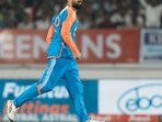 Rajkot: India's Varun Chakravarthy celebrates the wicket of England's Jofra Archer during the third T20 cricket match between India and England at the Niranjan Shah Stadium in Rajkot.