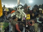 Devotees are seen struggling to escape after a stampede occurred at Sangam on 'Mauni Amavasya' during the ongoing 'Maha Kumbh Mela' festival, in Prayagraj, Wednesday, January 29, 2025. Devotees are seen struggling to escape after a stampede occurred at Sangam on 'Mauni Amavasya' during the ongoing 'Maha Kumbh Mela' festival, in Prayagraj, Wednesday, January 29, 2025.
