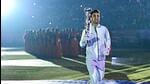Uttarakhand badminton star Lakshya Sen carries the torch during the National Games opening ceremony in Dehradun on Tuesday. (ANI)