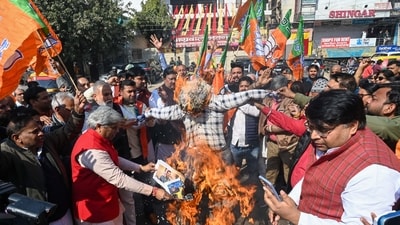 BJP party leaders and workers held a protest march and burned effigy of Arvind Kejriwal over his Yamuna 'poisoning' remark. (PTI) BJP party leaders and workers held a protest march and burned effigy of Arvind Kejriwal over his Yamuna 'poisoning' remark. (PTI)