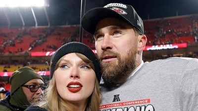 KANSAS CITY, MISSOURI - JANUARY 26: Taylor Swift celebrates with Travis Kelce #87 of the Kansas City Chiefs after defeating the Buffalo Bills 32-29 in the AFC Championship Game at GEHA Field at Arrowhead Stadium on January 26, 2025 in Kansas City, Missouri. David Eulitt/Getty Images/AFP (Photo by David Eulitt / GETTY IMAGES NORTH AMERICA / Getty Images via AFP) (Getty Images via AFP) KANSAS CITY, MISSOURI - JANUARY 26: Taylor Swift celebrates with Travis Kelce #87 of the Kansas City Chiefs after defeating the Buffalo Bills 32-29 in the AFC Championship Game at GEHA Field at Arrowhead Stadium on January 26, 2025 in Kansas City, Missouri. David Eulitt/Getty Images/AFP (Photo by David Eulitt / GETTY IMAGES NORTH AMERICA / Getty Images via AFP) (Getty Images via AFP)