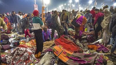 Family members of injured devotees after the stampede in Prayagraj on Wednesday. (PTI Photo) Family members of injured devotees after the stampede in Prayagraj on Wednesday. (PTI Photo)