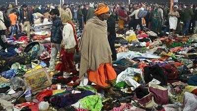 Pilgrims look for their belongings at the site of a stampede amid the ongoing Maha Kumbh Mela festival in Prayagraj. (AFP) Pilgrims look for their belongings at the site of a stampede amid the ongoing Maha Kumbh Mela festival in Prayagraj. (AFP)