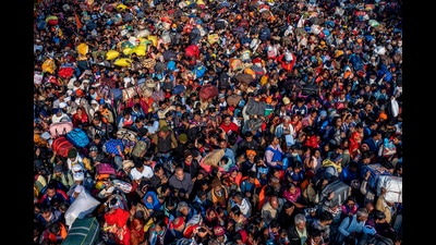 Indian Hindu devotees arrive for a holy dip at Sangam, the confluence of the Ganges, the Yamuna and the mythical Saraswati rivers, on the eve of the 'Mauni Amavasya' or new moon day during the Maha Kumbh festival, in Prayagraj, Uttar Pradesh, India, Tuesday, Jan. 28, 2025. (AP Photo/Rajesh Kumar Singh) (AP) Indian Hindu devotees arrive for a holy dip at Sangam, the confluence of the Ganges, the Yamuna and the mythical Saraswati rivers, on the eve of the 'Mauni Amavasya' or new moon day during the Maha Kumbh festival, in Prayagraj, Uttar Pradesh, India, Tuesday, Jan. 28, 2025. (AP Photo/Rajesh Kumar Singh) (AP)