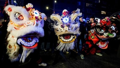 Dancers wearing lion costumes perform during a midnight Lunar New Year celebration, marking the Year of the Snake, in New York City's Chinatown section, in Manhattan, U.S. January 28, 2025. REUTERS/Adam Gray (REUTERS)