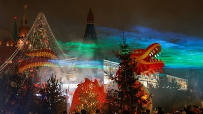 A dragon figure is seen in front of the Kremlin during the celebration on the eve of the Lunar New Year, in Moscow. The Chinese enjoy eight consecutive public holidays for the 2025 Spring Festival, an opportunity to share meals, attend traditional performances, and set off firecrackers and fireworks. (REUTERS)