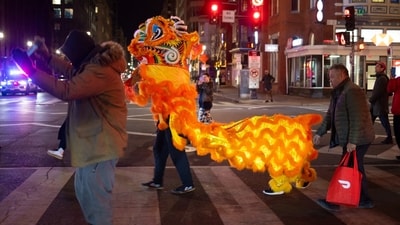Local residents in a lion costume perform during the celebration on the eve of the Lunar New Year in the area known as Chinatown in Washington, U.S. January 28, 2025. REUTERS/Carlos Barria (REUTERS)