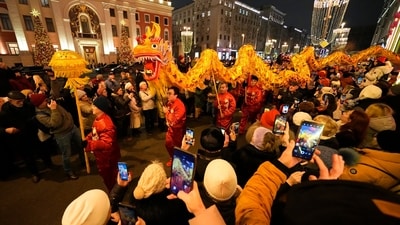 Dragon dancers perform during celebrations of Lunar New Year with a large procession in Moscow, Russia, Tuesday, Jan. 28, 2025. (AP Photo/Alexander Zemlianichenko) (AP)