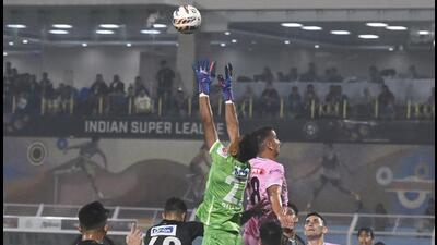 Mohammedan Sporting Club (in black) players in action against Bengaluru FC in the Indian Super League in Kolkata in November, 2024. (PTI) Mohammedan Sporting Club (in black) players in action against Bengaluru FC in the Indian Super League in Kolkata in November, 2024. (PTI)
