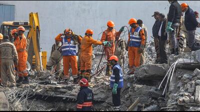 Rescue work underway for a third day. (PTI) Rescue work underway for a third day. (PTI)