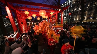 Dragon dancers perform during celebrations of Lunar New Year with a large procession in Tverskoy boulevard in historical center of Moscow, Russia. (AP)
