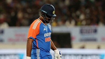 India's Sanju Samson walks after losing his wicket, caught by England's Adil Rashid off the bowling of Jofra Archer. (REUTERS)