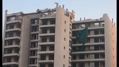 The developer of the Chintels Paradiso condominium in Gurugram Sector 109 has begun demolishing the first of six residential towers that were declared unsafe by the district administration earlier. (HT PHOTO)