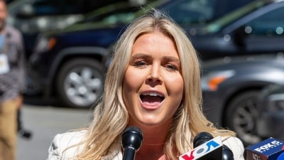 FILE - Karoline Leavitt speaks to the news media across the street from Republican presidential nominee former President Donald Trump's criminal trial in New York, May 28, 2024. (AP Photo/Ted Shaffrey, File) FILE - Karoline Leavitt speaks to the news media across the street from Republican presidential nominee former President Donald Trump's criminal trial in New York, May 28, 2024. (AP Photo/Ted Shaffrey, File)