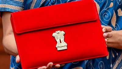 Union finance minister Nirmala Sitharaman carrying the Budget tablet wrapped in a traditional 'Bahi Khata' style pouch, last year. ( (ANI Photo/Rahul Singh)) Union finance minister Nirmala Sitharaman carrying the Budget tablet wrapped in a traditional 'Bahi Khata' style pouch, last year. ( (ANI Photo/Rahul Singh))