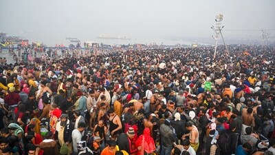 Scores of devotees are seen at the Sangam as they gather to take a holy dip on the occasion of 'Mauni Amavasya', during the Maha Kumbh Mela, in Prayagraj, Wednesday. (PTI) Scores of devotees are seen at the Sangam as they gather to take a holy dip on the occasion of 'Mauni Amavasya', during the Maha Kumbh Mela, in Prayagraj, Wednesday. (PTI)