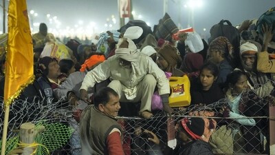 Devotees are seen struggling to escape after a stampede occurred at Sangam on 'Mauni Amavasya' during the ongoing 'Maha Kumbh Mela' festival, in Prayagraj, Wednesday, January 29, 2025. (PTI) Devotees are seen struggling to escape after a stampede occurred at Sangam on 'Mauni Amavasya' during the ongoing 'Maha Kumbh Mela' festival, in Prayagraj, Wednesday, January 29, 2025. (PTI)