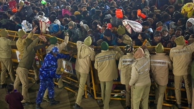 Security personnel try to control the pilgrims near the site of a stampede amid the ongoing Maha Kumbh Mela festival in Prayagraj on January 29, 2025. (AFP) Security personnel try to control the pilgrims near the site of a stampede amid the ongoing Maha Kumbh Mela festival in Prayagraj on January 29, 2025. (AFP)