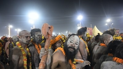Sadhus are seen returning without doing their amrit snan (holy dip) after a stampede on 'Mauni Amavasya' during at the Maha Kumbh mela. (PTI) Sadhus are seen returning without doing their amrit snan (holy dip) after a stampede on 'Mauni Amavasya' during at the Maha Kumbh mela. (PTI)