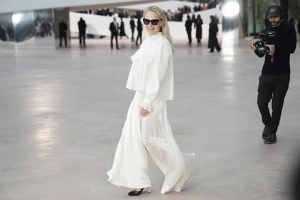 Pamela Anderson arrives at the Chanel Haute Couture Spring Summer 2025 collection. (AP) Pamela Anderson arrives at the Chanel Haute Couture Spring Summer 2025 collection. (AP)