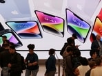 Customers queue at the Apple Fifth Avenue store for the release of the Apple iPhone 14 range in Manhattan, New York City, U.S.