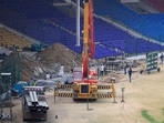 Technicians and labourers work during a media tour, organized by the Pakistan Cricket Board (PCB), to showcase the progress of the renovation work ahead of the ICC Champions Trophy 2025