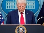 President Donald Trump pauses for a moment of silence before the press briefing to mourn the death of those who died in the Washington plane crash. President Donald Trump pauses for a moment of silence before the press briefing to mourn the death of those who died in the Washington plane crash.