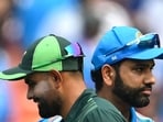 (FILES) India's captain Rohit Sharma (R) and his Pakistani counterpart Babar Azam (FILES) India's captain Rohit Sharma (R) and his Pakistani counterpart Babar Azam
