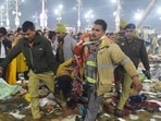 Mahakumbh Stampede: Police personnel carry an injured woman following a stampede before the 'Amrit Snan' on Wednesday.