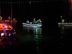 An emergency response team with Washington, DC Fire and EMS make their way to airplane wreckage in the Potomac River near Ronald Reagan Washington Airport on January 30, 2025 in Arlington, Virginia. An American Airlines flight from Wichita, Kansas collided with a helicopter while approaching Ronald Reagan National Airport. (Photo by Andrew Harnik / GETTY IMAGES NORTH AMERICA / Getty Images via AFP)