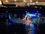 Emergency response units assess airplane wreckage in the Potomac River near Ronald Reagan Washington Airport on January 30, 2025 in Arlington, Virginia.
